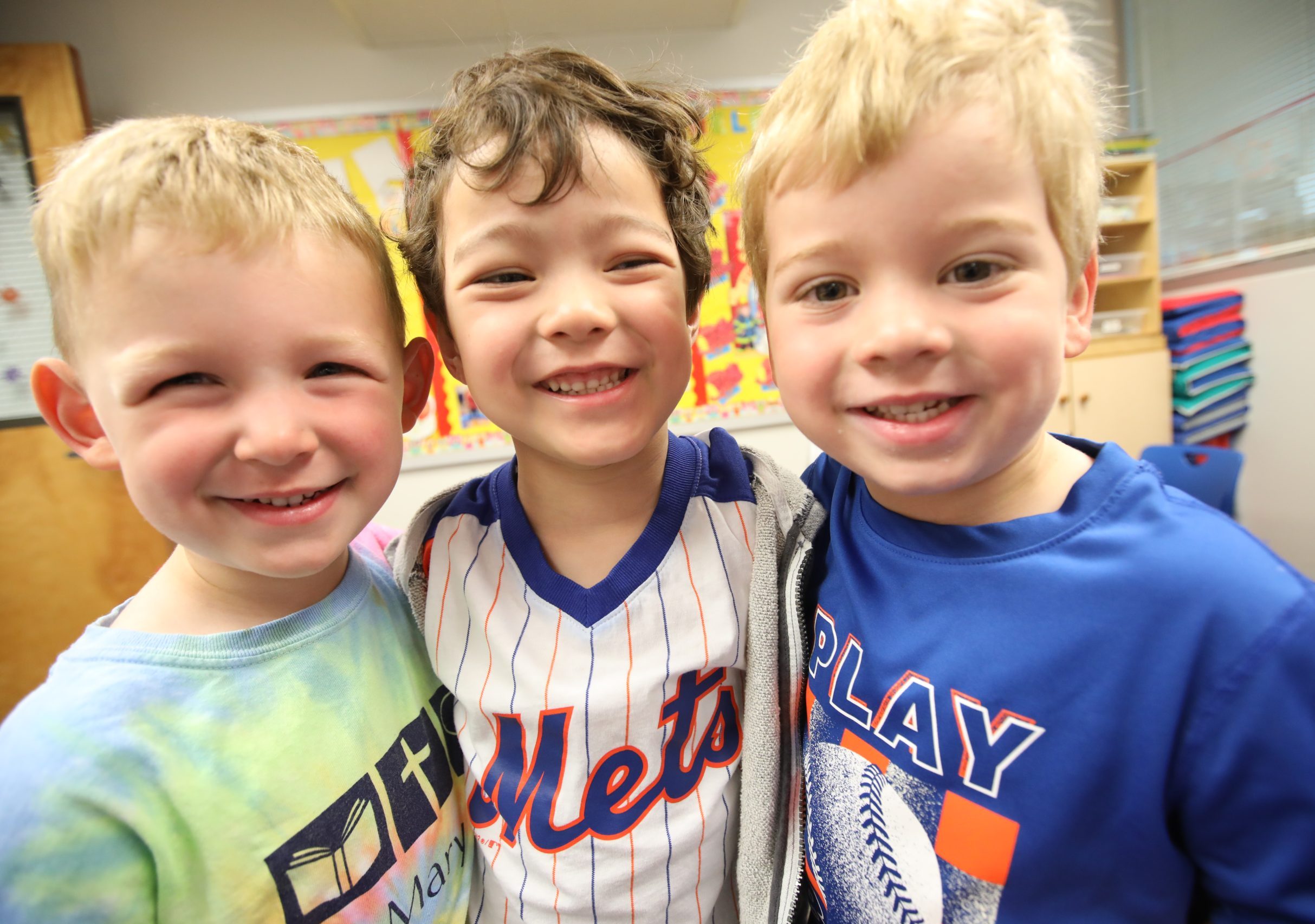 Preschool friends smiling