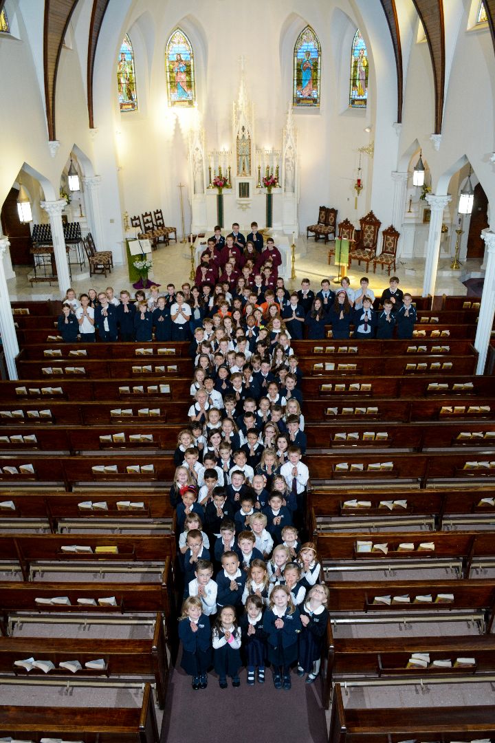 Students in church shaped like a cross