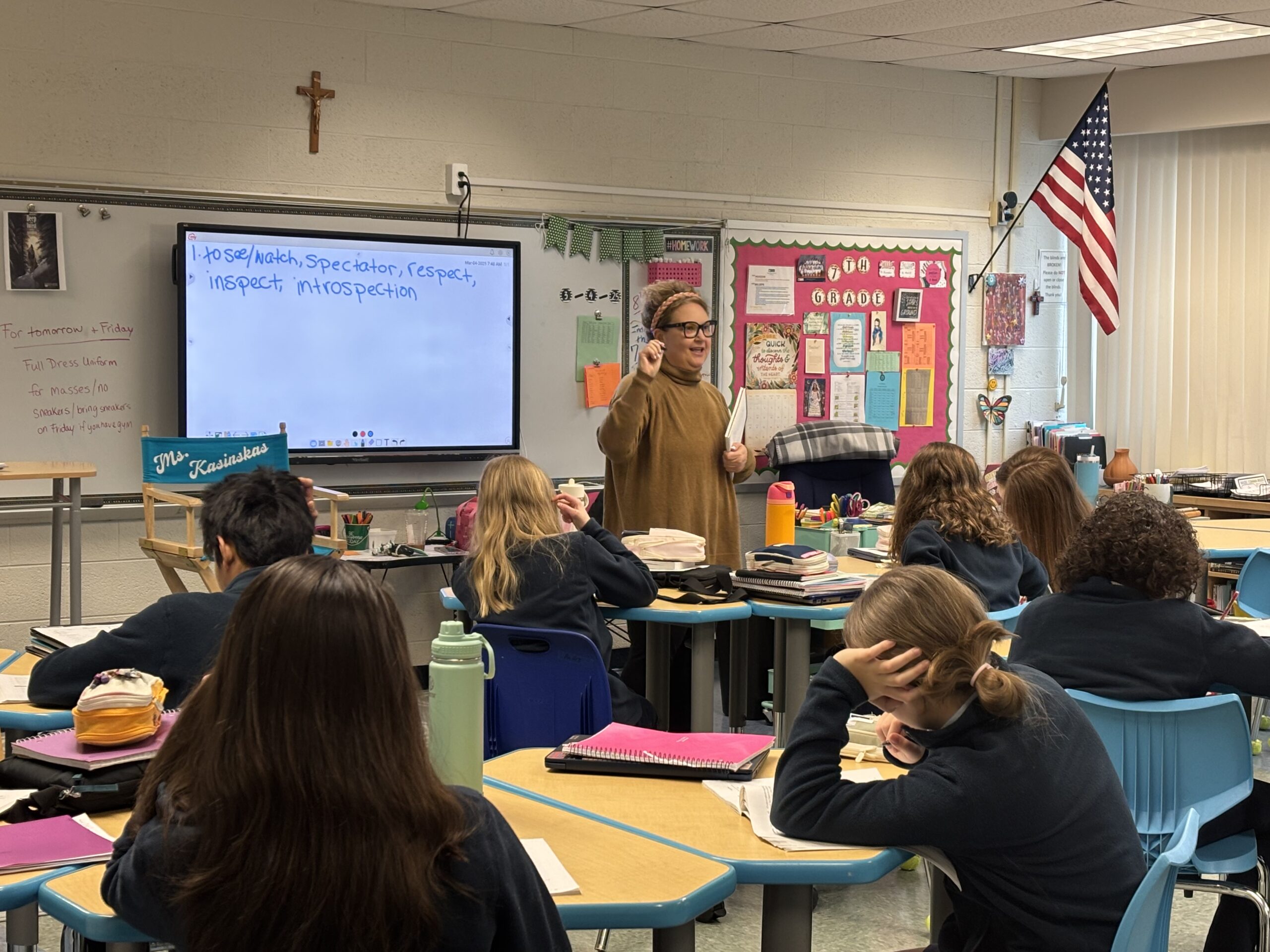 ELA teacher Ms. Kasinskas reviewing vocabulary words with Grade 7 students