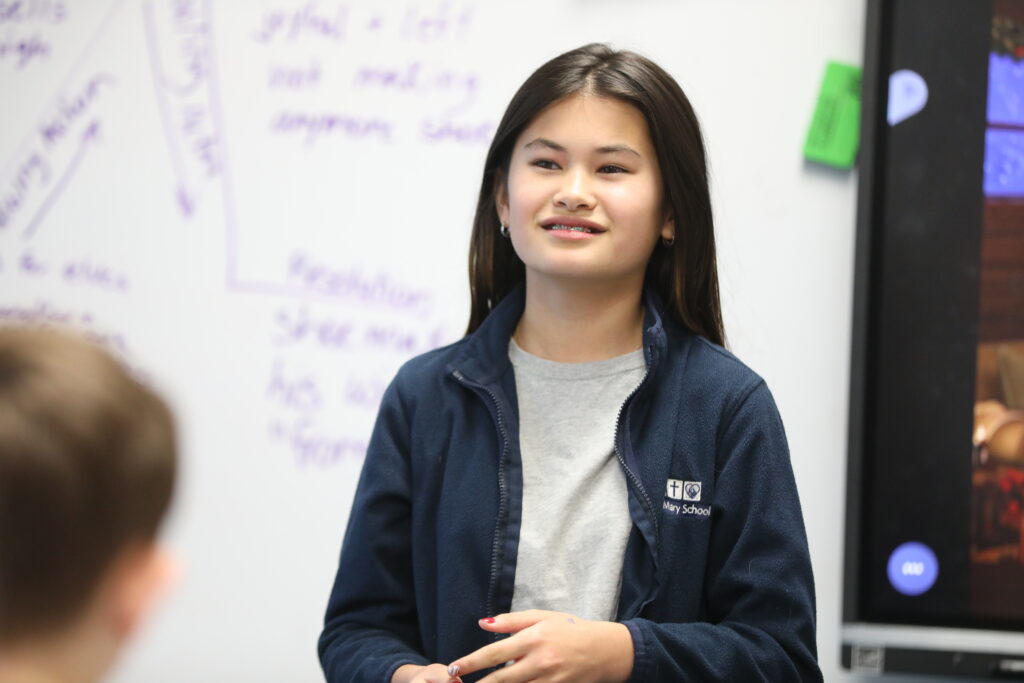 Student at front of class