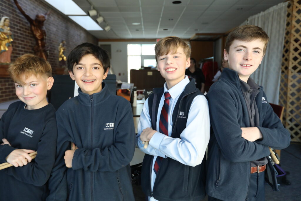 Middle School Boys smiling post Music