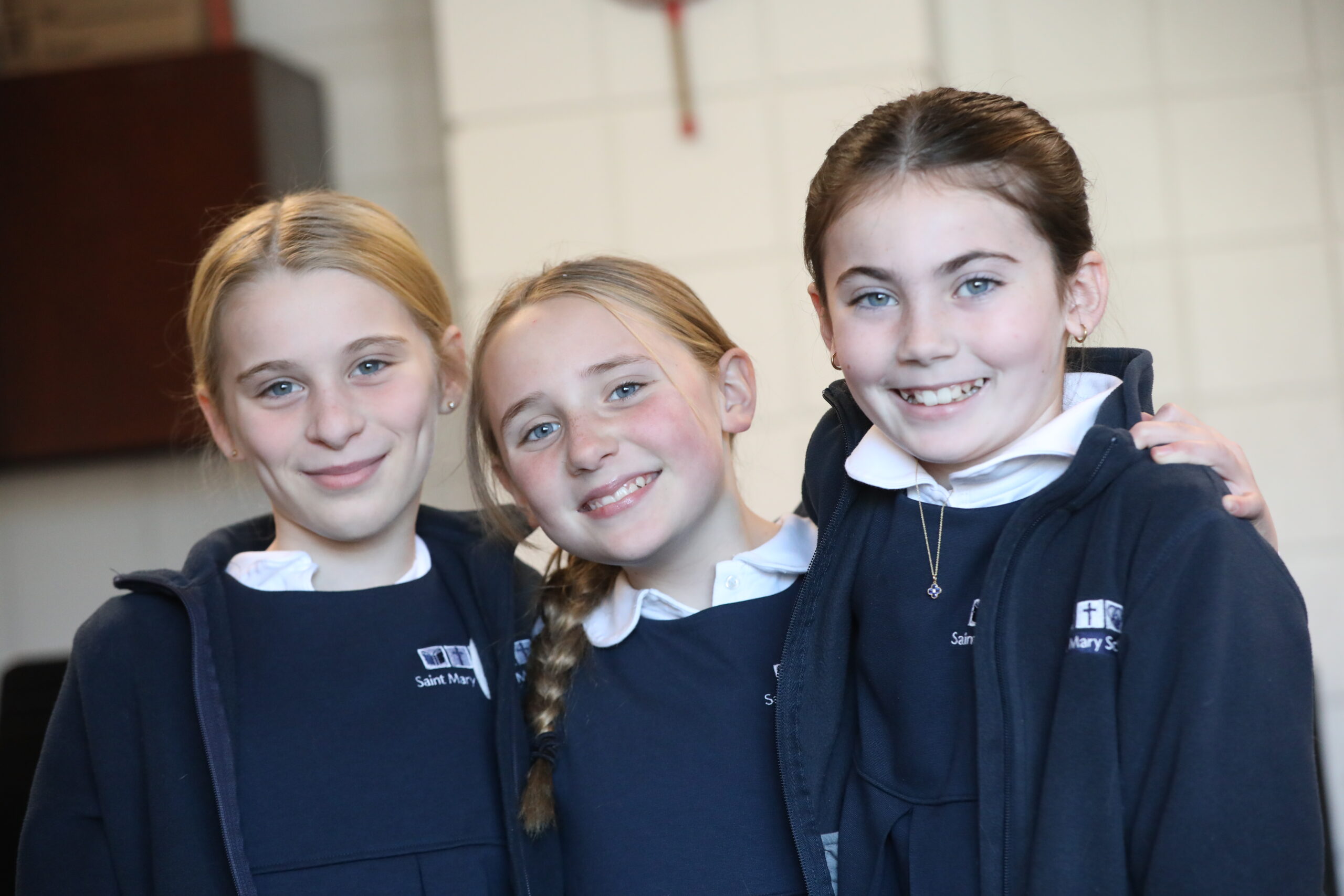 3 Elementary School Girls with cross