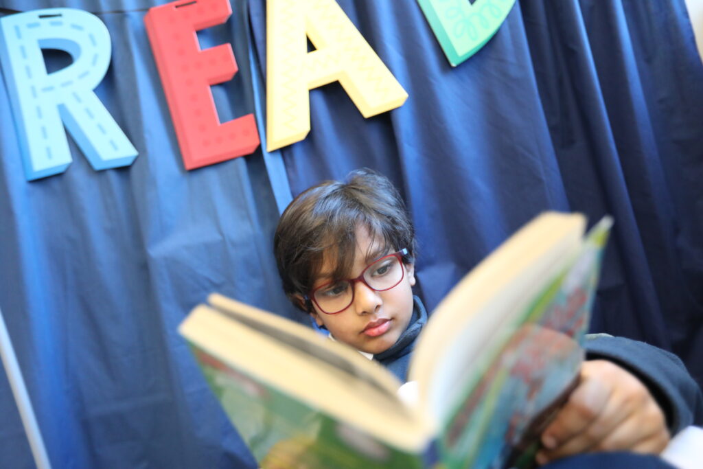 Grade 2 boy in reading corner