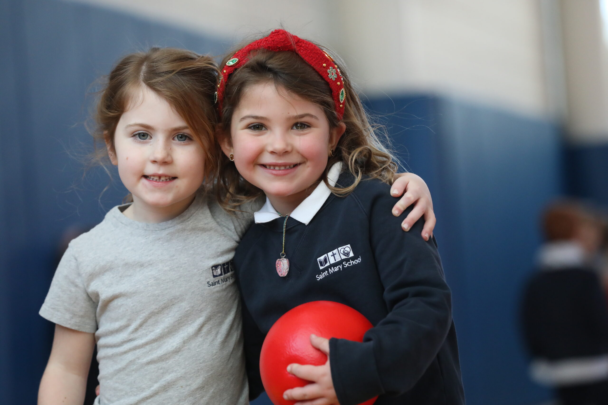 Two TK friends hugging