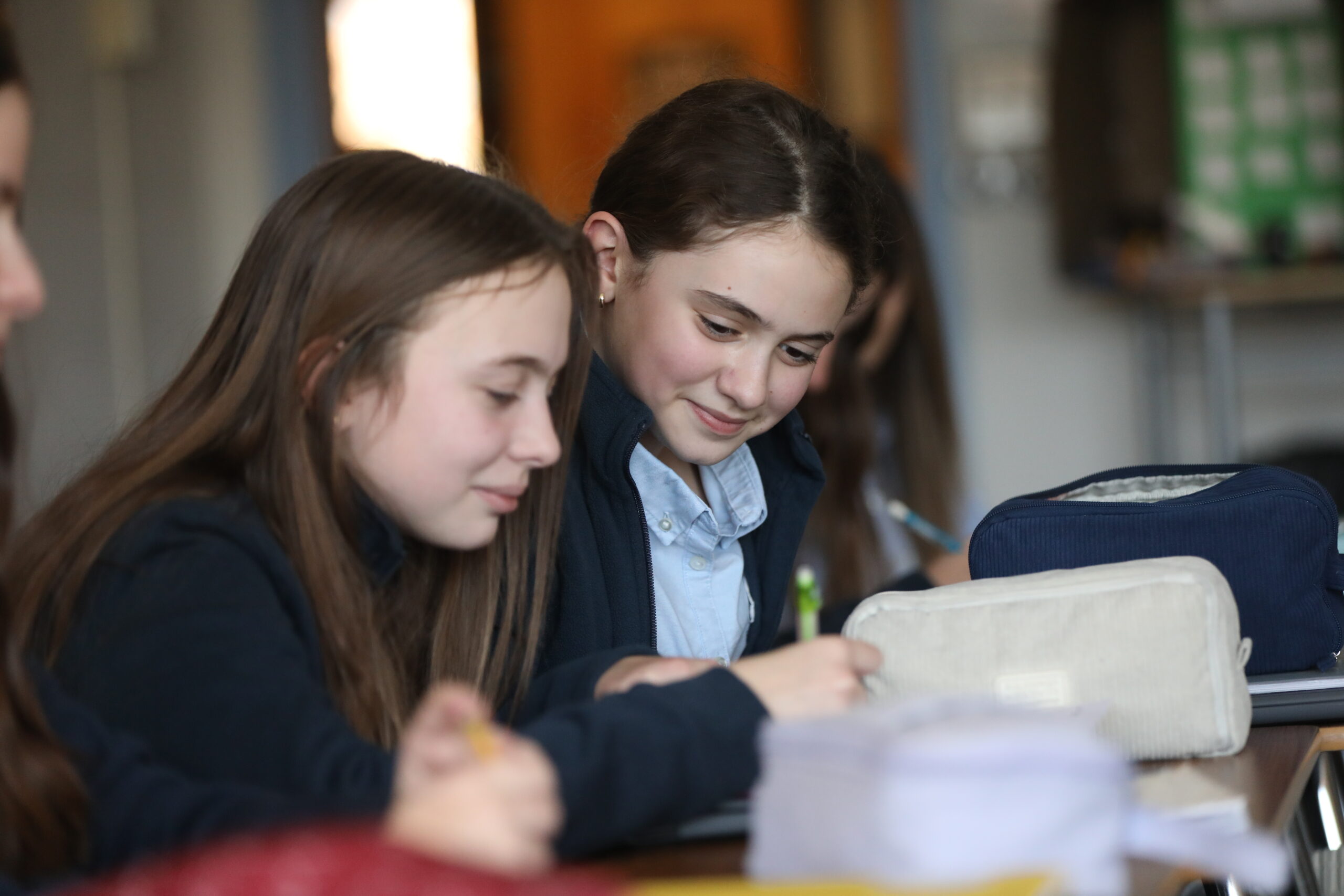 Two girls working quietly