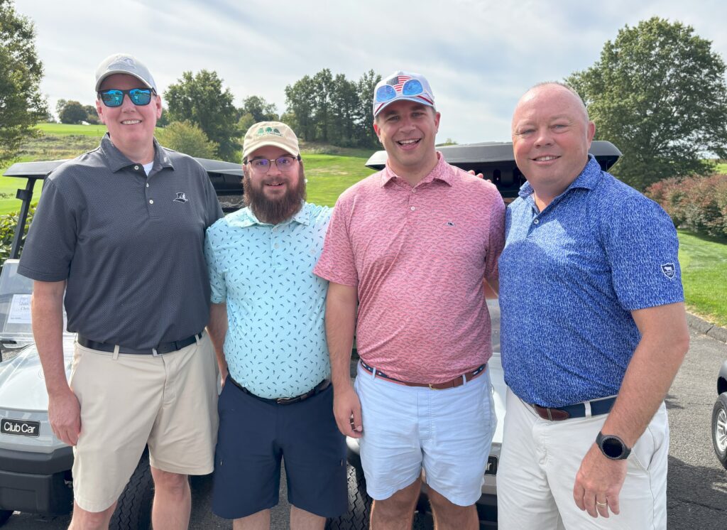 foursome at golf outing
