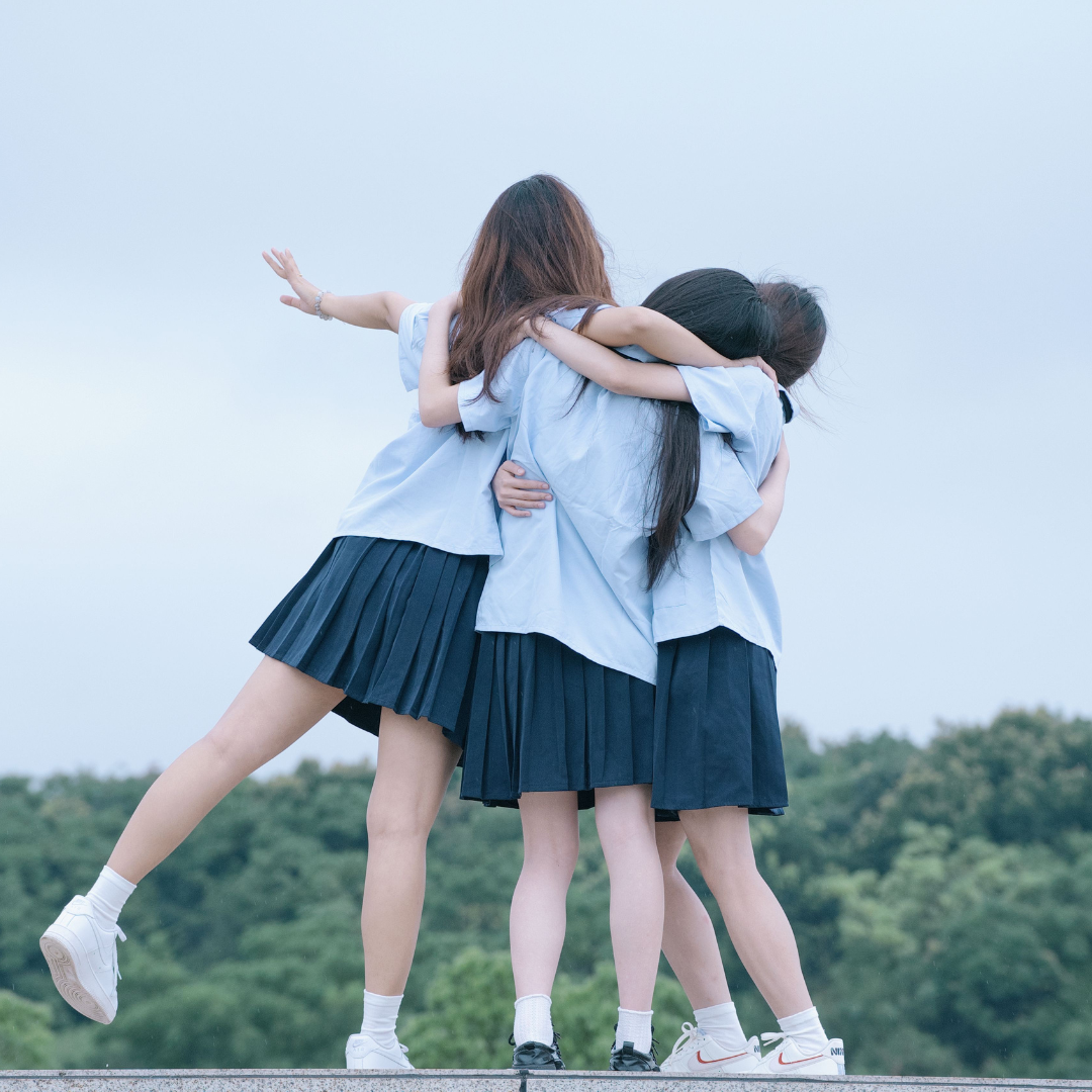 girls hugging